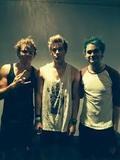 Michael Clifford, Luke Hemmings, and Ashton Irwin.