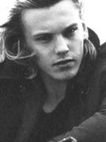 Jamie Campbell Bower - as Ezra Harrington