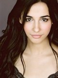 Naomi Scott as Marie Simpson